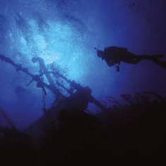Underwater photographer James Woodward, wreck and diver